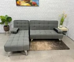 dark grey fabric corner sofa bed with chaiselongue